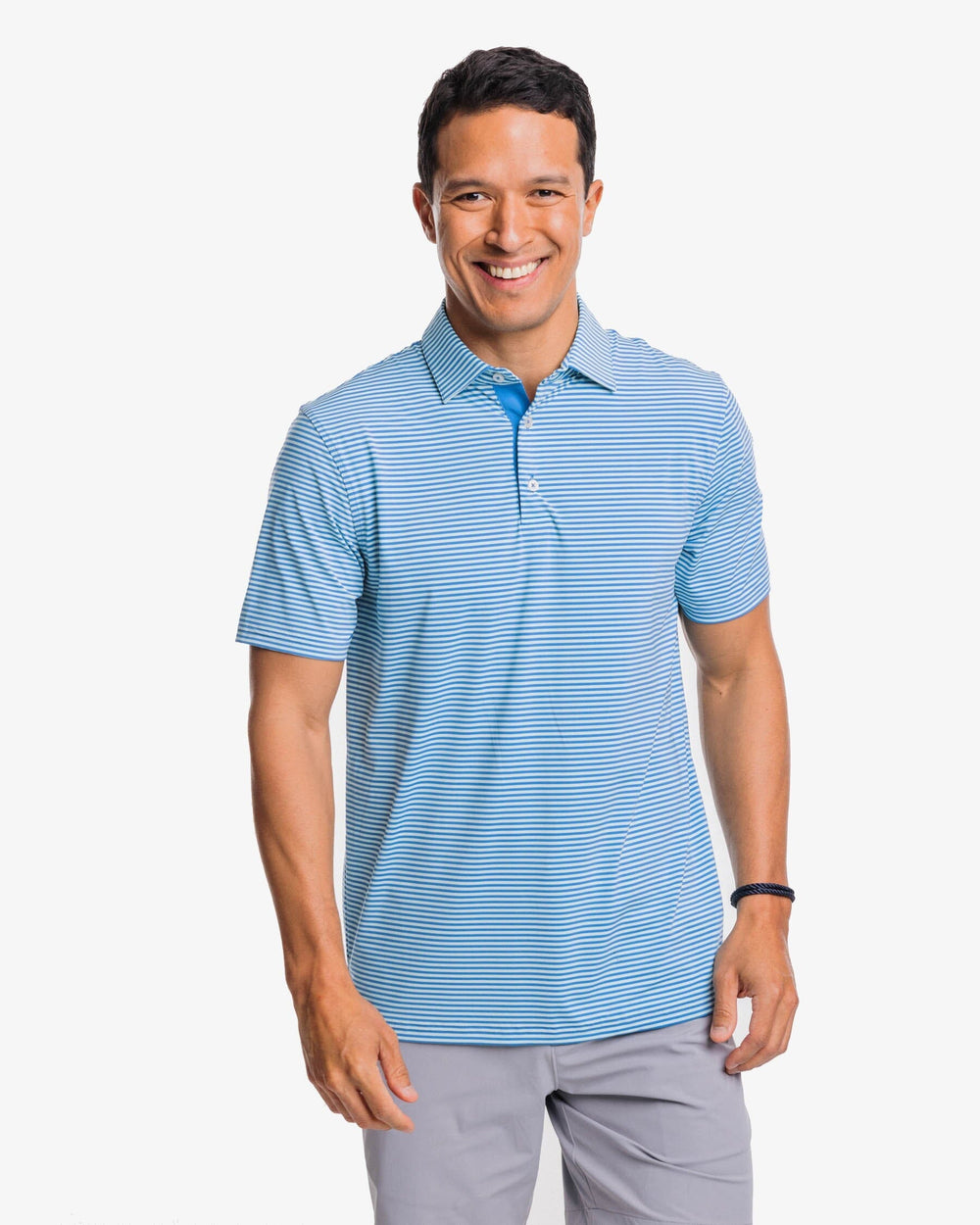 The front view of the Southern Tide Shores Stripe brrr eeze Performance Polo Shirt by Southern Tide - Baltic Teal