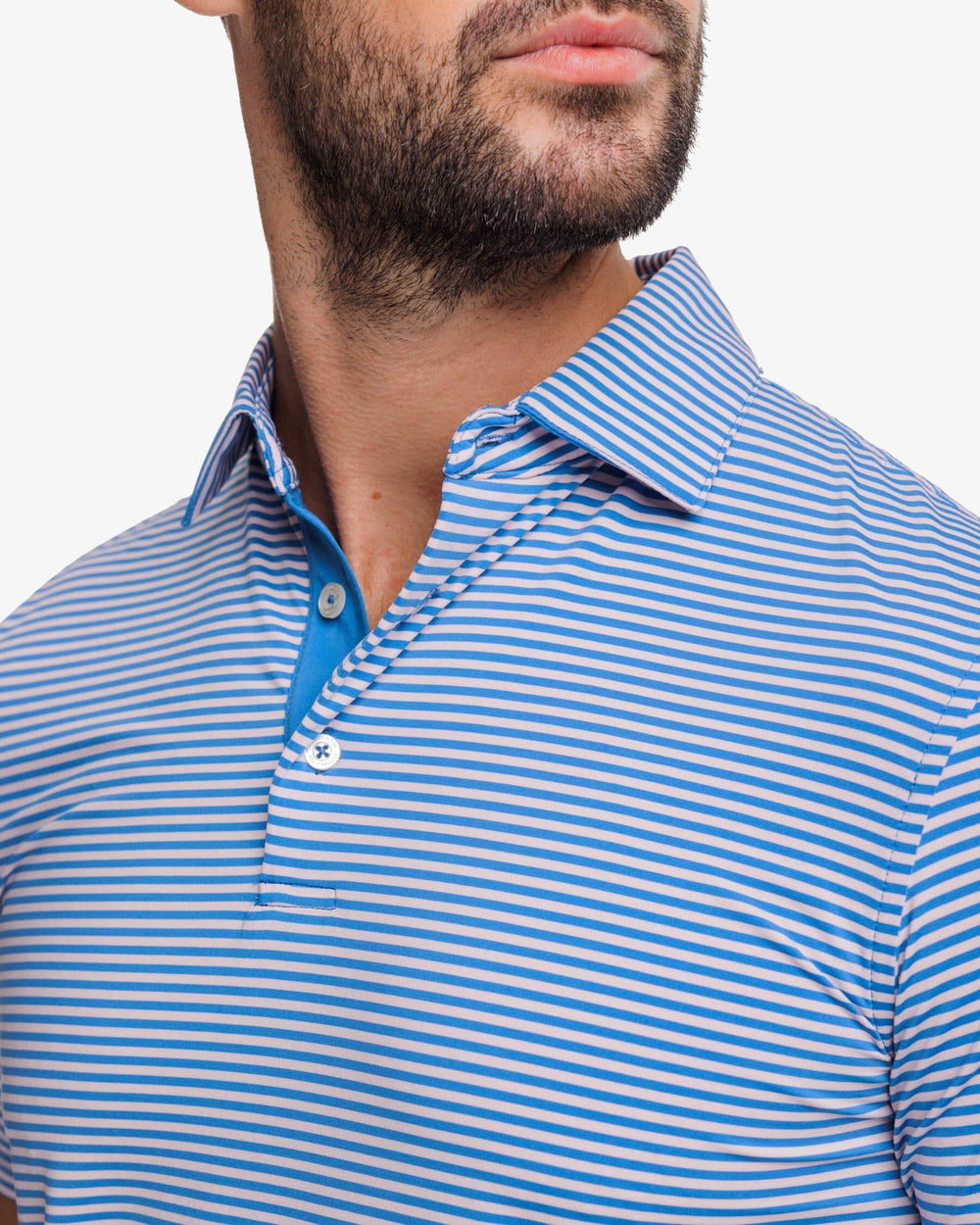 The detail view of the Southern Tide Shores Stripe brrr eeze Performance Polo Shirt by Southern Tide - Rose Blush