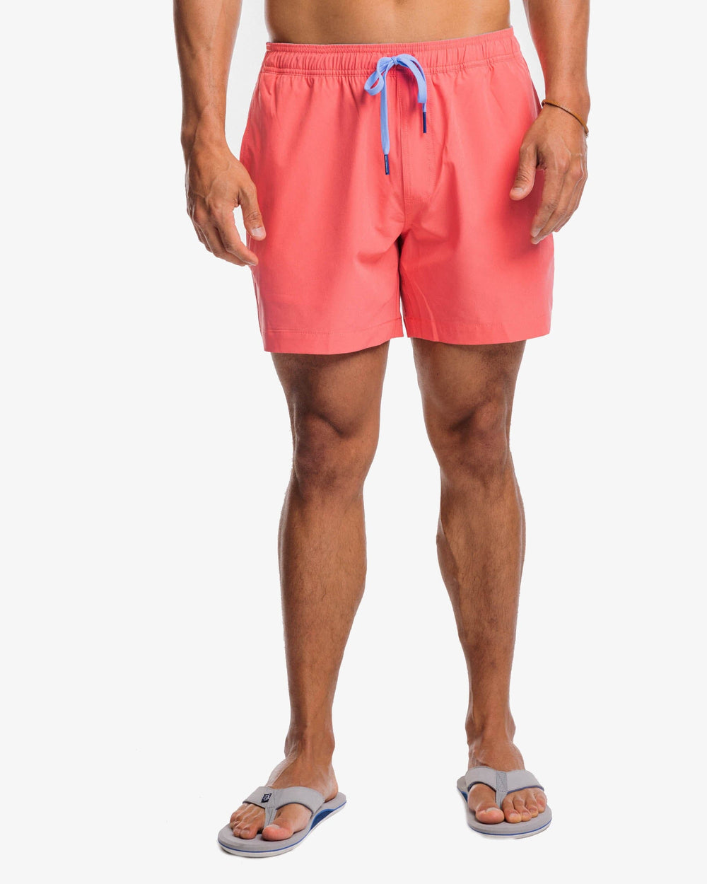 The front view of the Southern Tide Solid Swim Trunk 3 by Southern Tide - Sunkist Coral