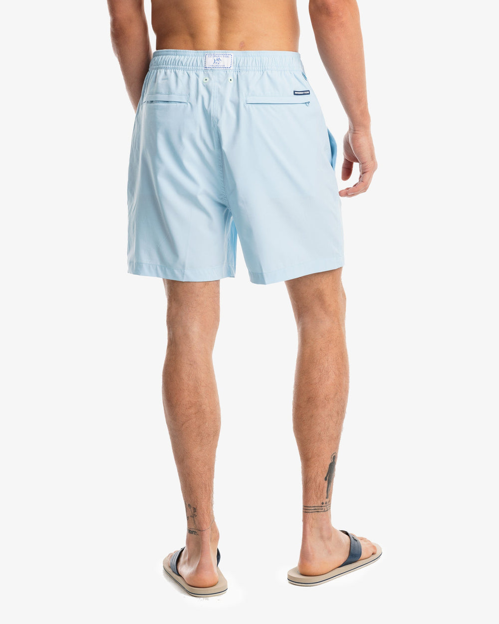 The model back view of the Men's Solid Swim Trunk by Southern Tide - Aquamarine
