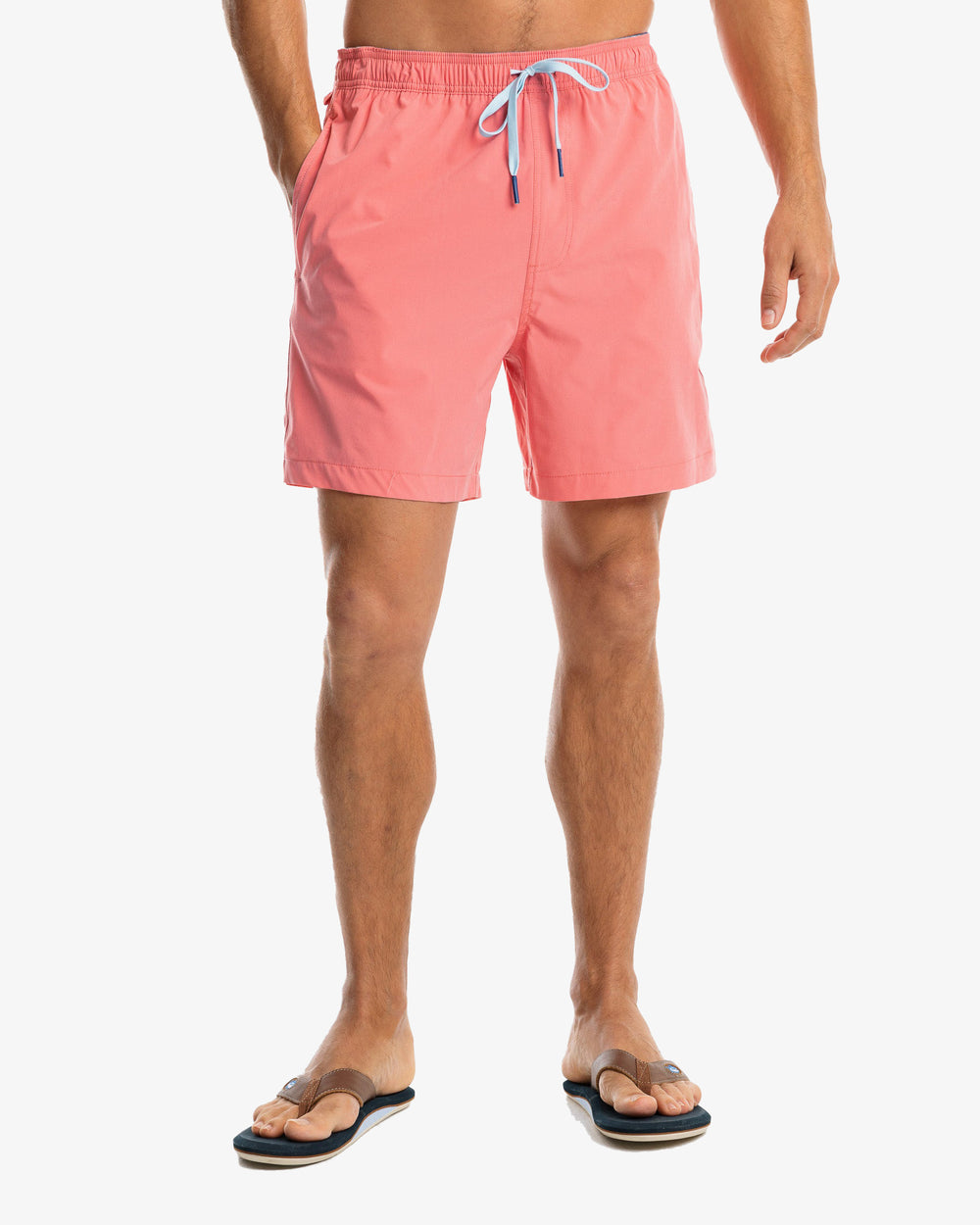 The model front view of the Men's Solid Swim Trunk by Southern Tide - Rouge Red