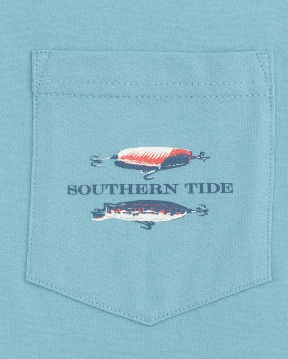 The pocket view of the Men's Bobbers and Lures Tide T-Shirt by Southern Tide - Brisk Blue