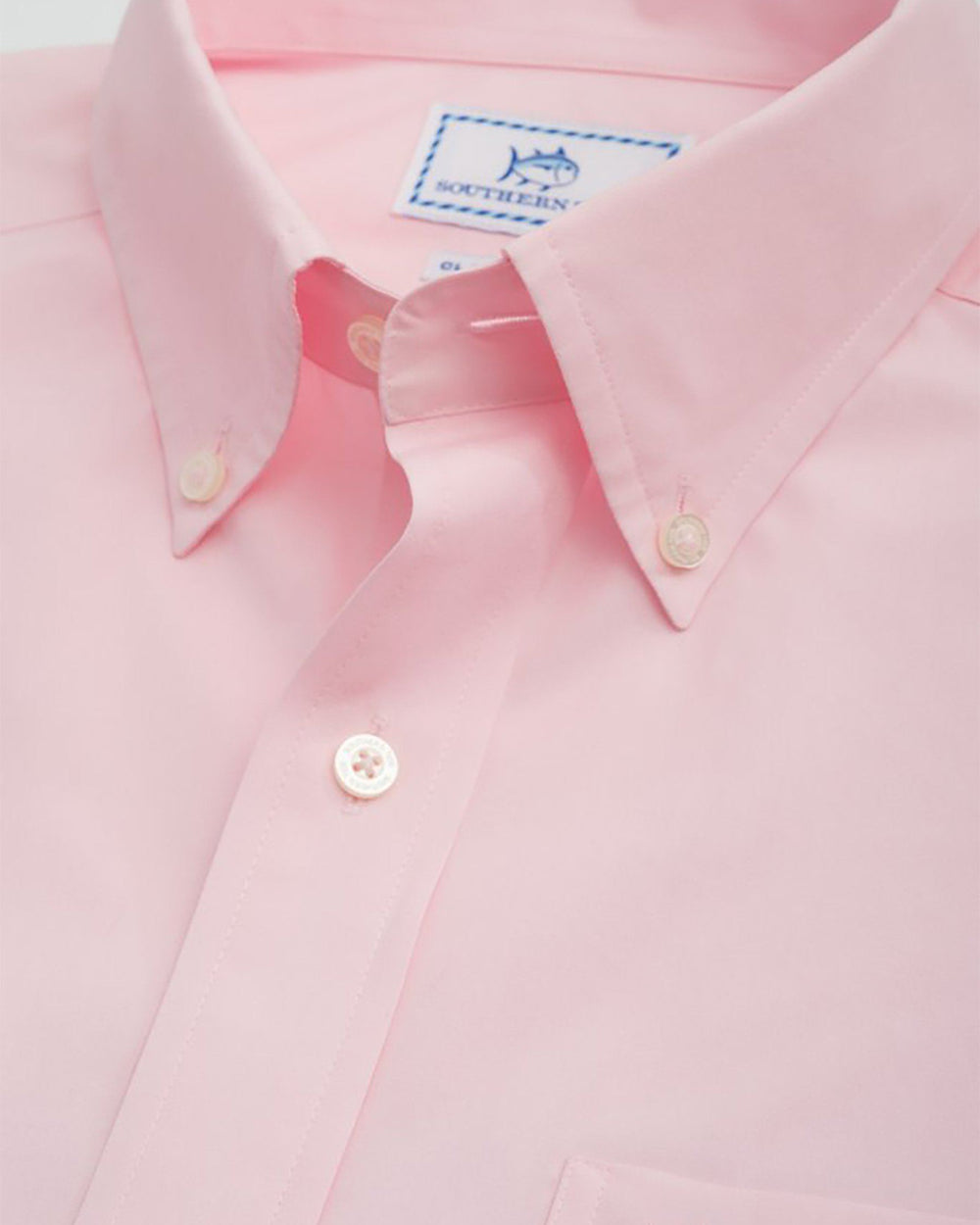 The detail of the Men's Pink Sullivans Solid Button Down Shirt by Southern Tide - Pink