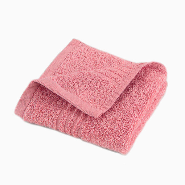 The front view of the Performance 5.0 Wash Cloth by Southern Tide - Geranium Pink - Wash Cloth