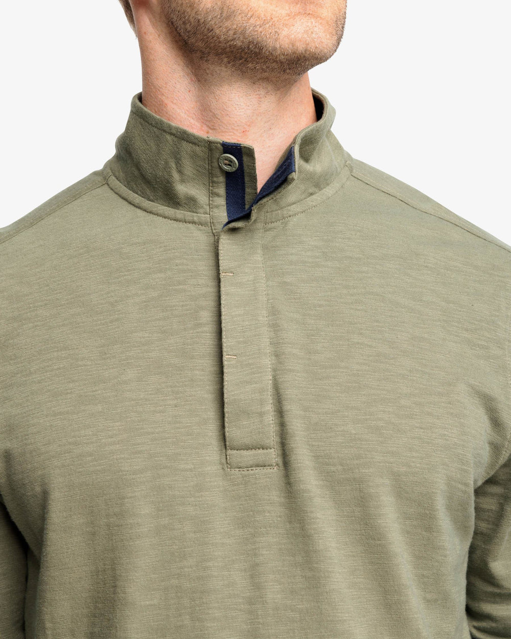The detail view of the Sun Farer Ocean View Quarter Button Pullover by Southern Tide - Pine