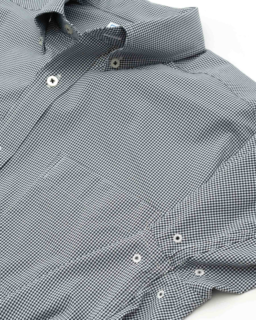 Arm vents of the Men's Black Wake Forest Gingham Button Down Shirt by Southern Tide - Black