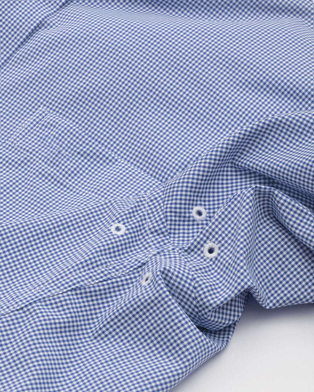 Arm vents of the Men's Light Blue Kentucky Wildcats Gingham Button Down Shirt by Southern Tide - University Blue