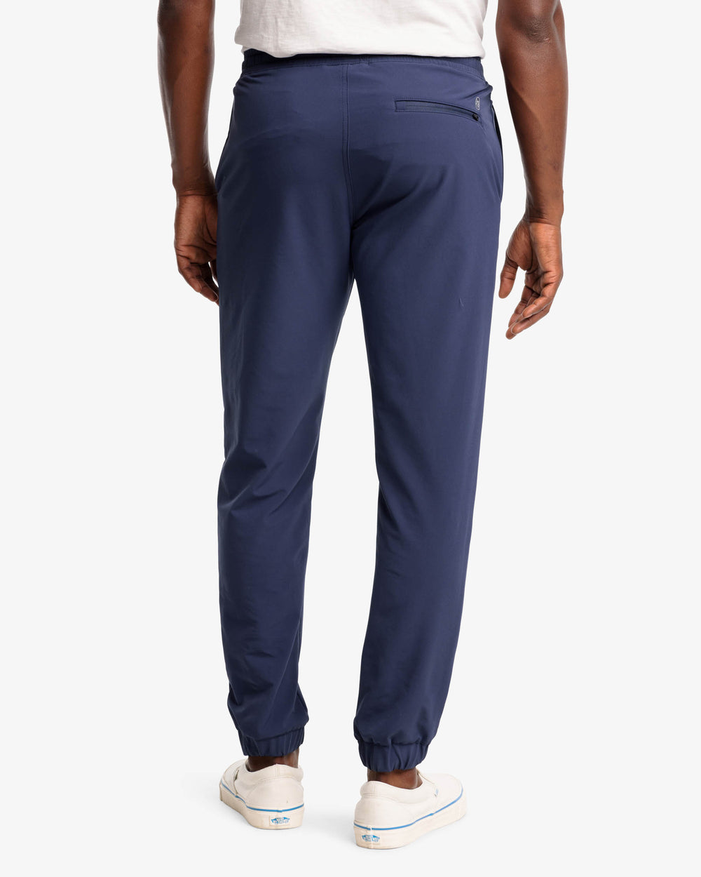 The back view of the The Excursion Performance Jogger by Southern Tide - True Navy