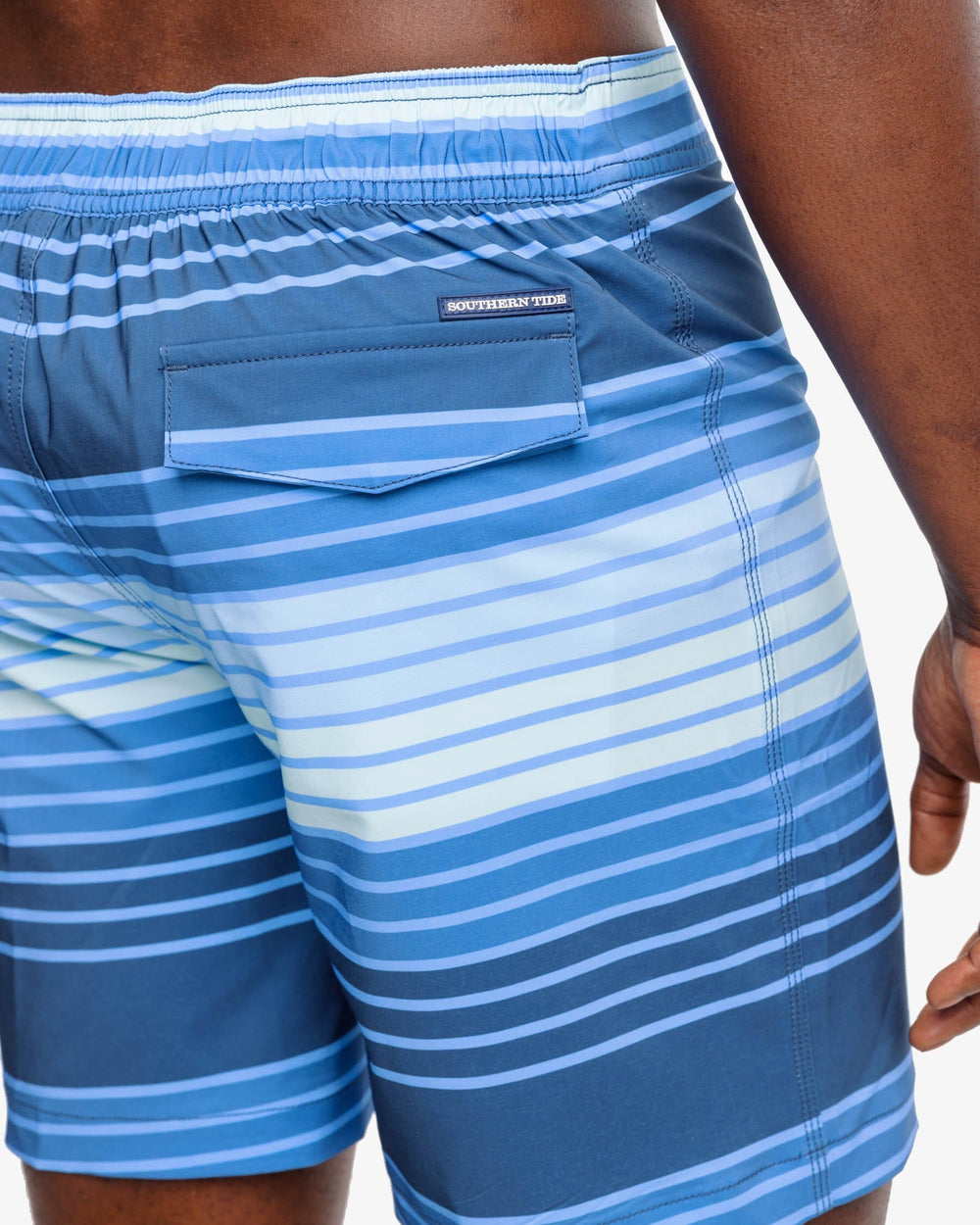 The detail view of the Southern Tide Wateree Stripe Printed Swim Short by Southern Tide - Aged Denim