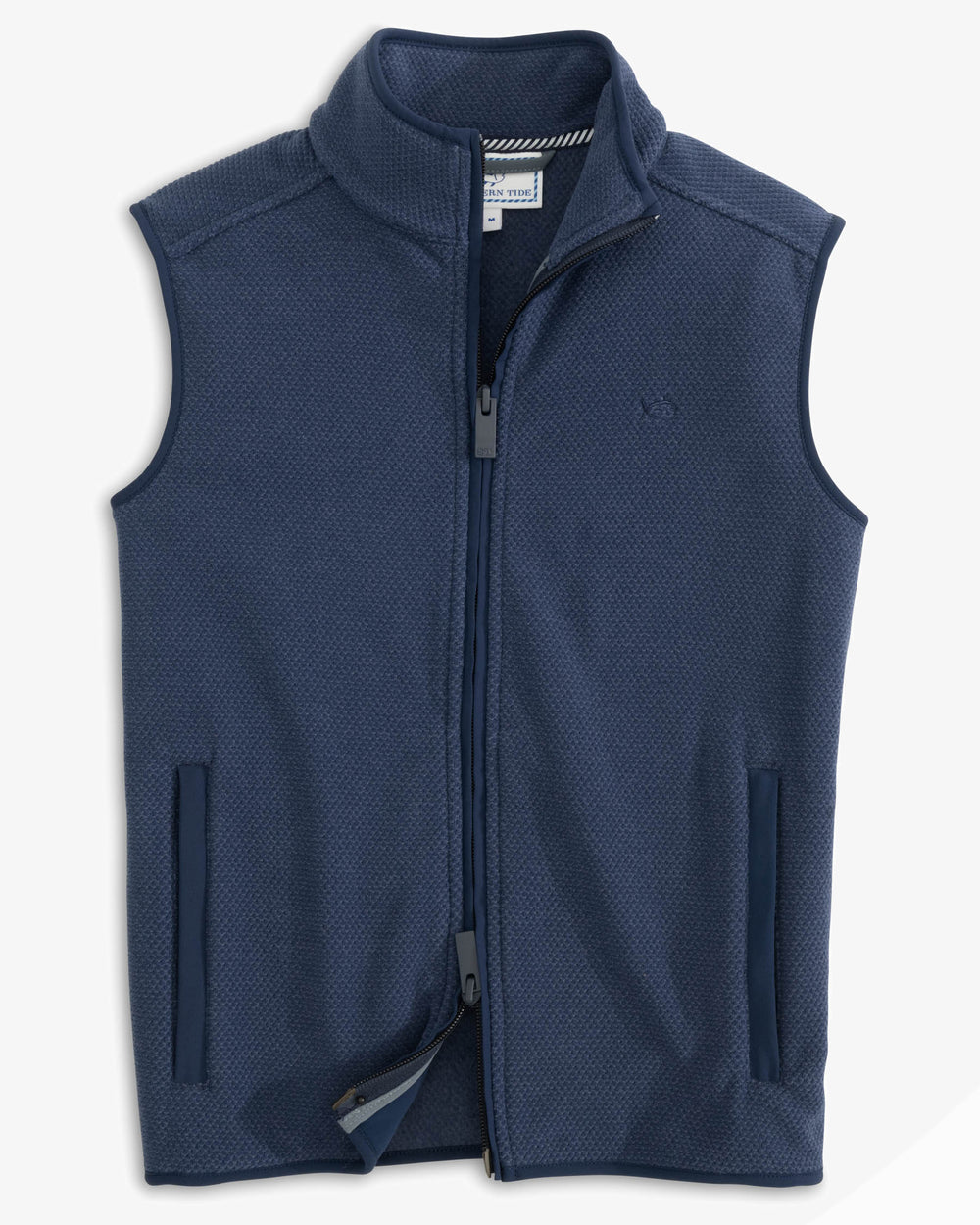 The front view of the Youth Hucksley Vest by Southern Tide - True Navy