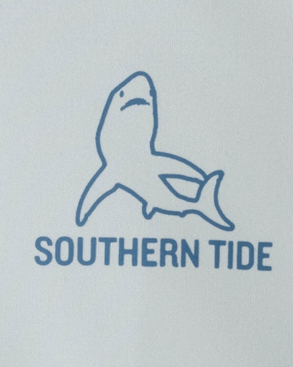 The detail view of the Southern Tide Youth Lined Shark Long Sleeve Performance T-Shirt by Southern Tide - Slate Grey
