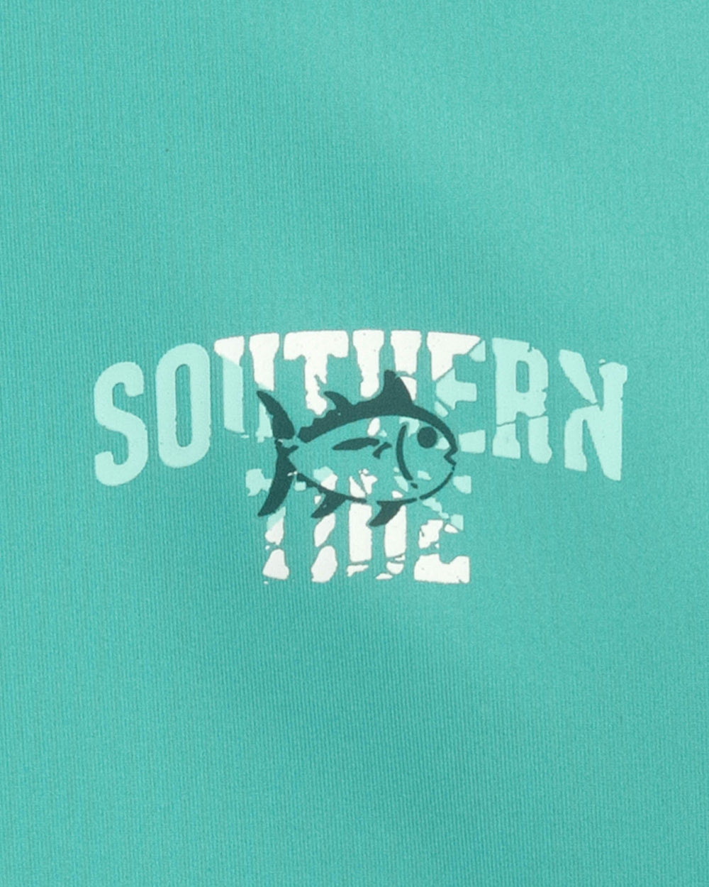The detail view of the Southern Tide Youth Skipjack Breakthrough Performance T-Shirt by Southern Tide - Tidal Wave